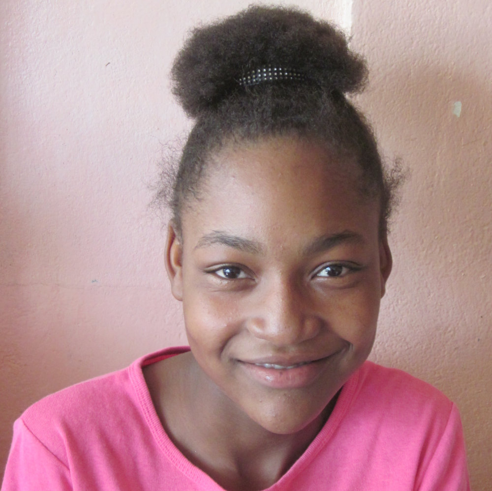 Haitian teen smiling