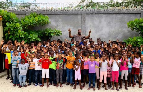 Connect 2 Ministries children with pastor taking a group photo