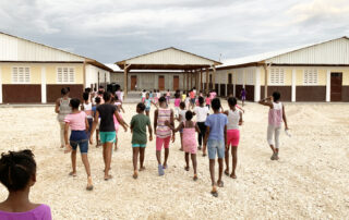Haitian female children walking as a group