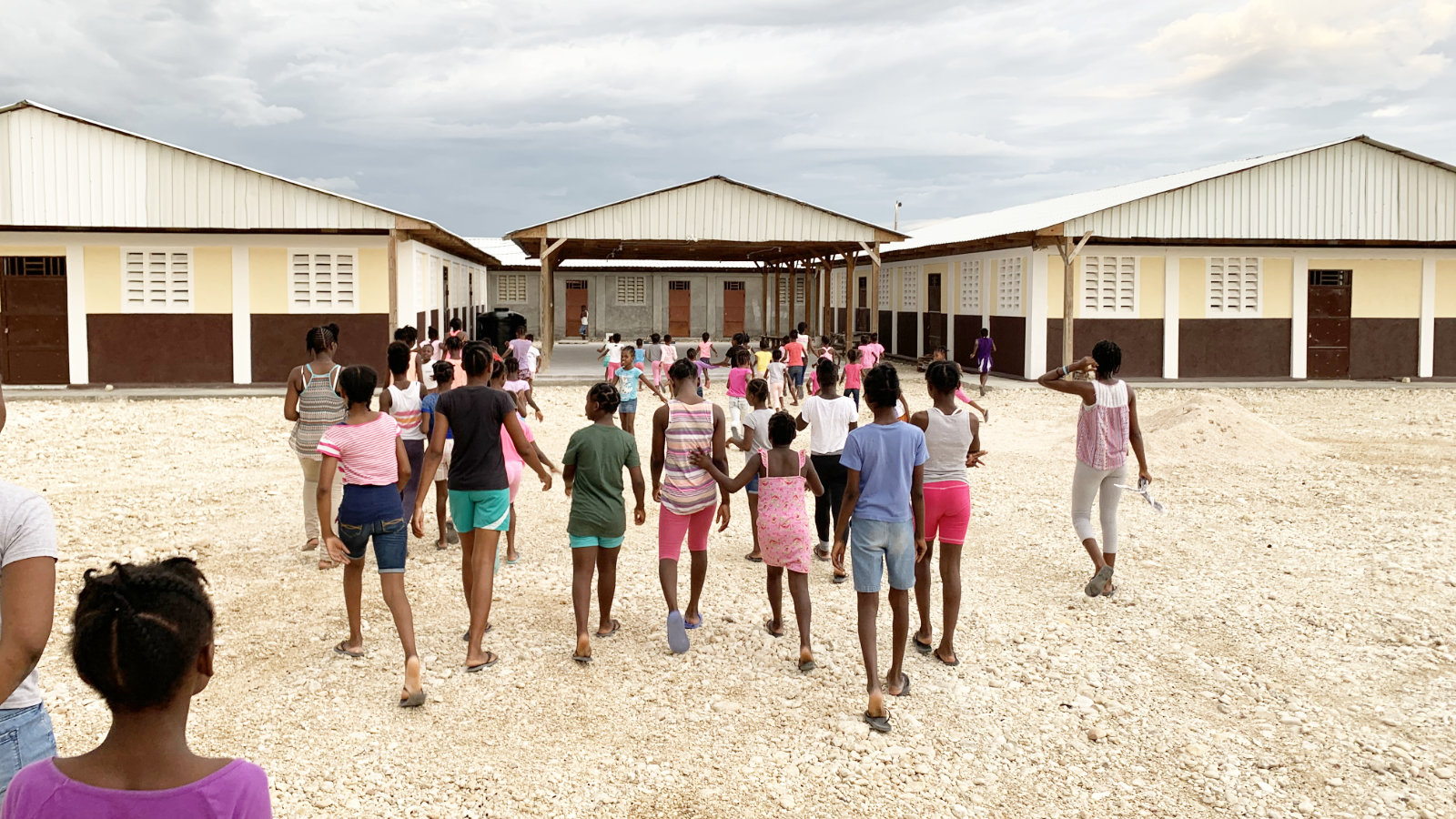 Haitian female children walking as a group