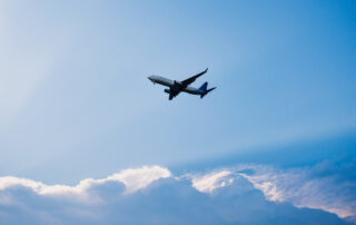 passanger-plane-in-flight-in-clouds