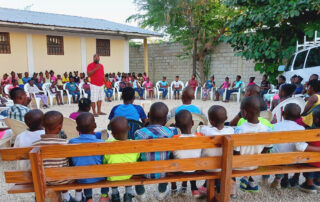 pastor with children