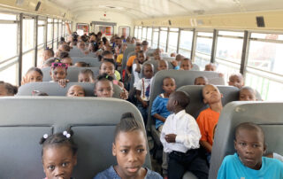 Haiti childern on school bus