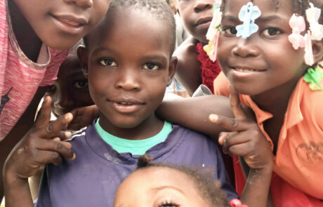 happy smiling Haitian children posing for a picture