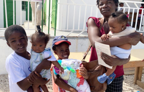 Haitian mother wither four young children