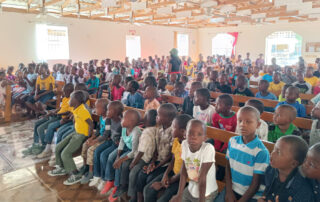 VBS program, large group of children in church