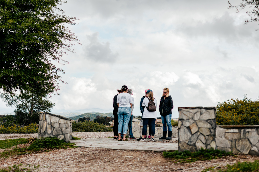 Volunteers praying at park