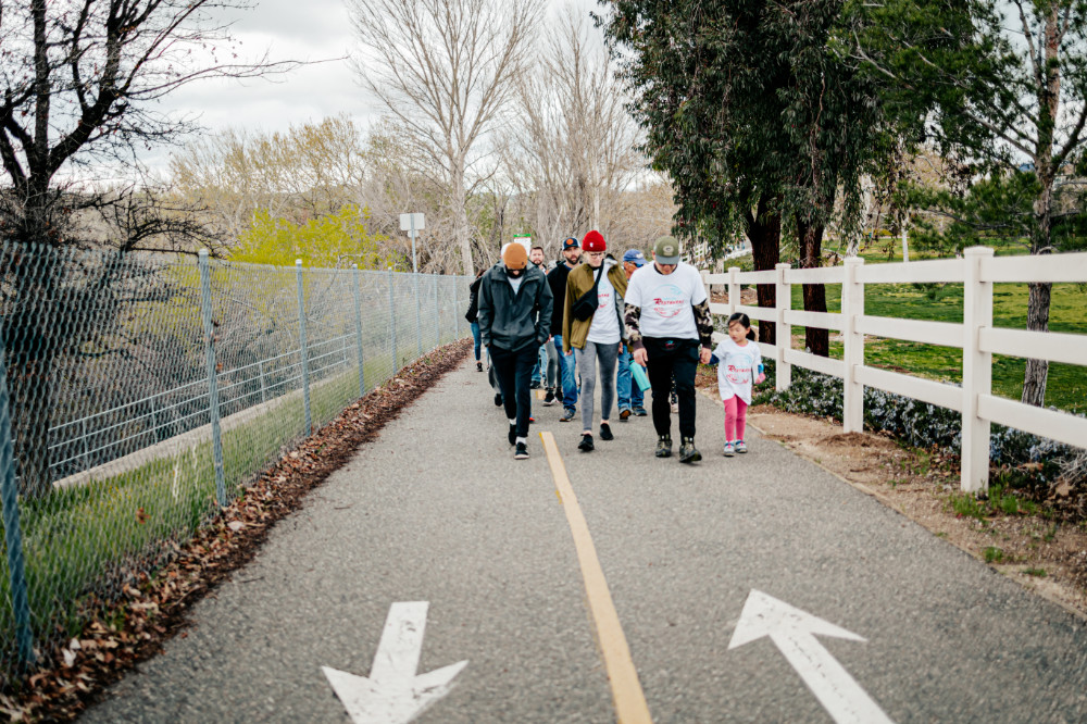 volunteers walking on a park path