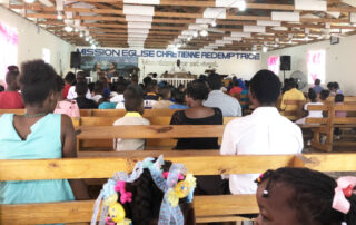 Haitian residents in church.