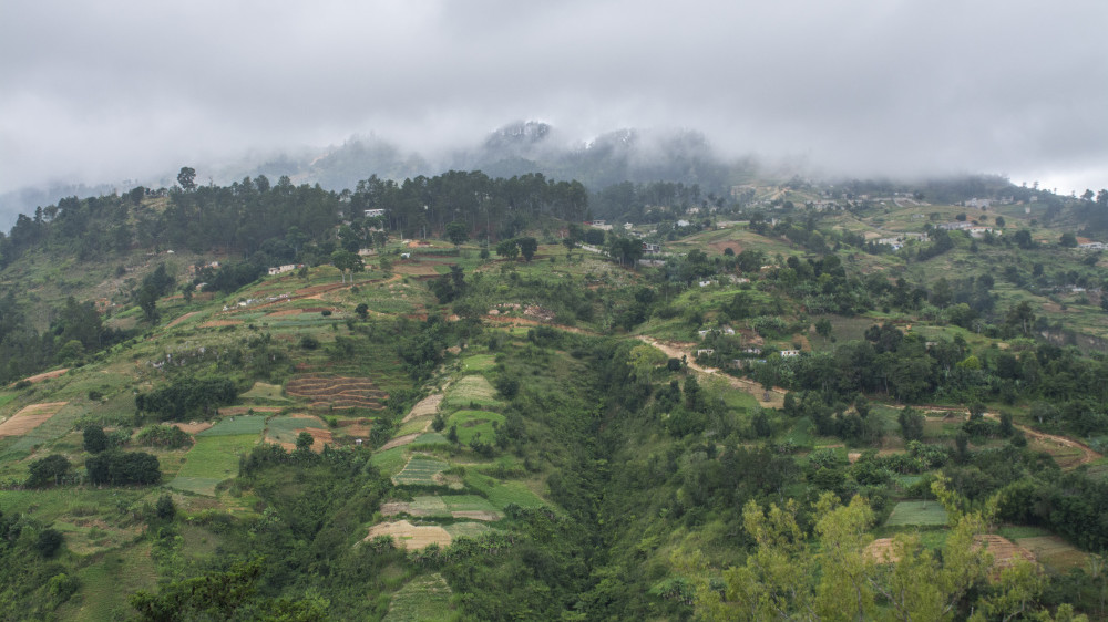 Clouds discending on Haiti hillside landscape.