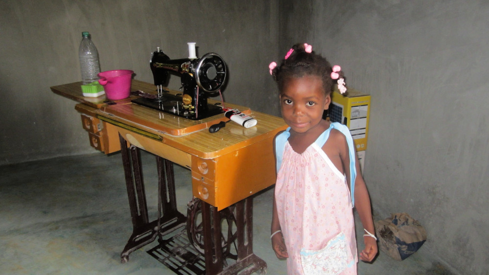 Haiti April 2017 girl and a sewing machine