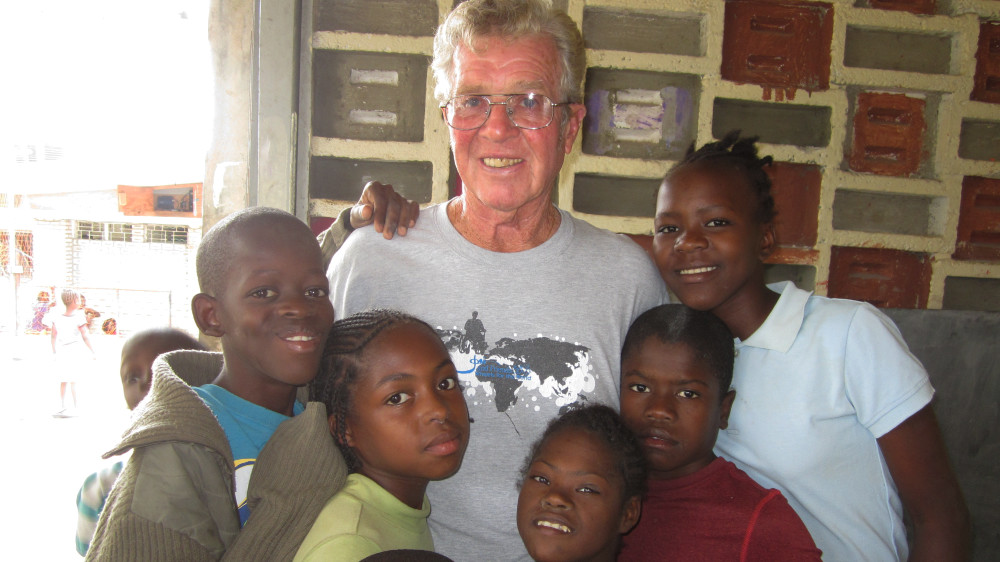 Mac Mcgaha and kids in Haiti