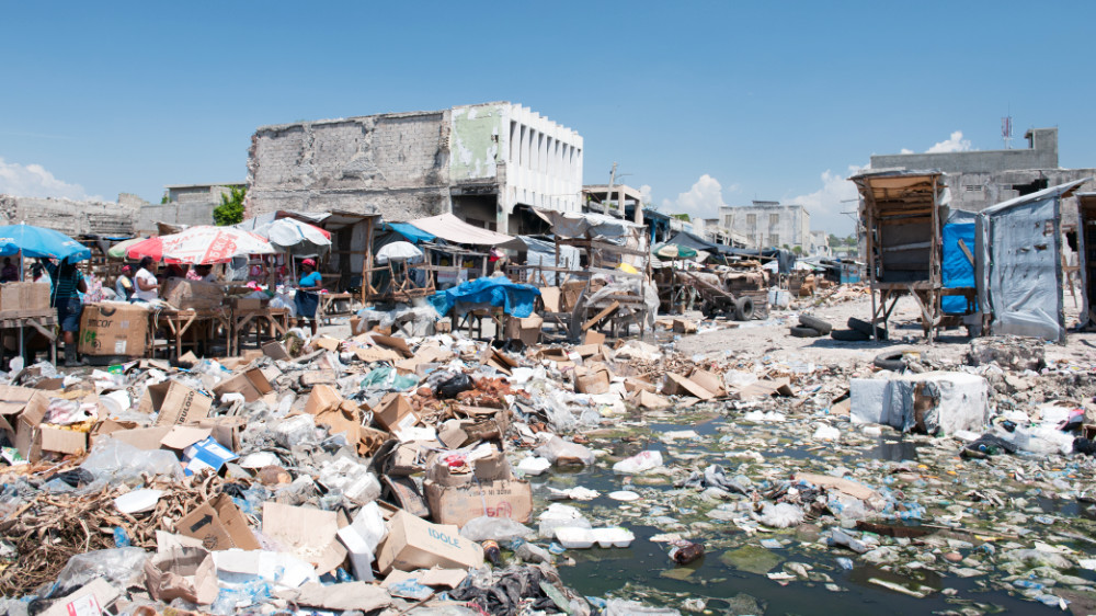 Downtown Port au Prince covered with trash.