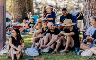 Simi Valley Walk participants sitting on lawn smiling.