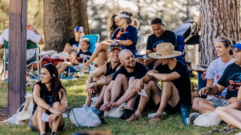 Simi Valley Walk participants sitting on lawn smiling.