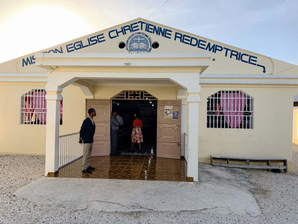 Locals entering church in Haiti