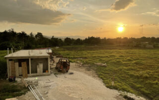 Haiti Grassy Field and a Construction site