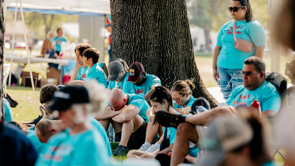 Group of people gathering to pray for Restaveks children of Haiti.